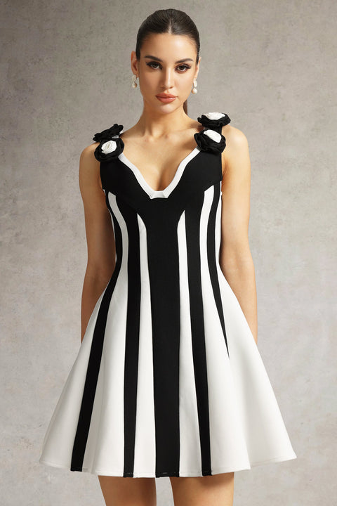 Serela Sleeveless V-Neck Flower Bandage Mini Dress by Bella Barnett