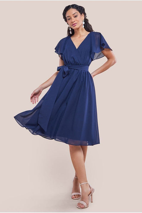 Sustainable Flutter Sleeve Chiffon Wrap Midi Dress - Navy by Goddiva