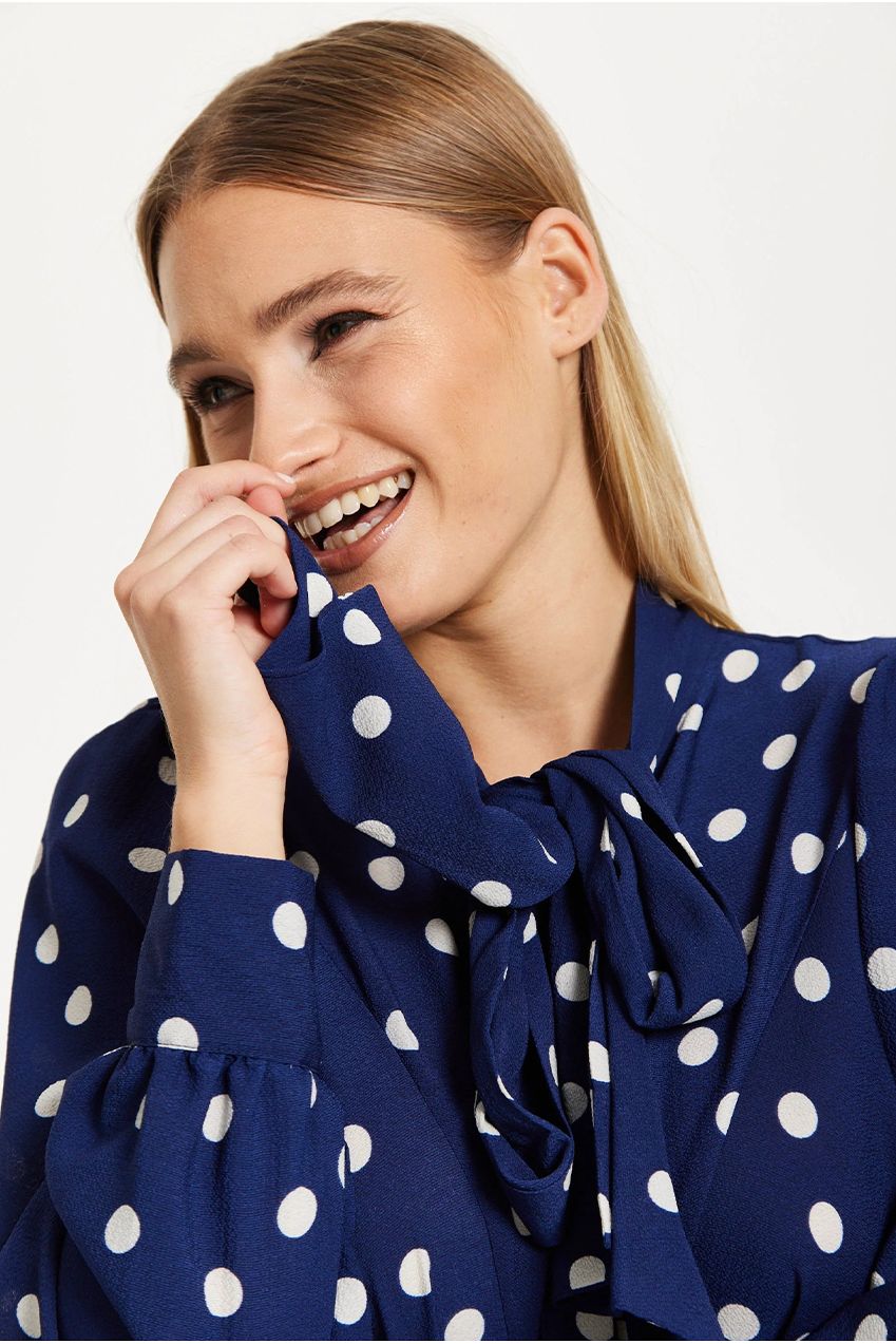 Navy Polka Dot Flared Hem Blouse 25SS8866009