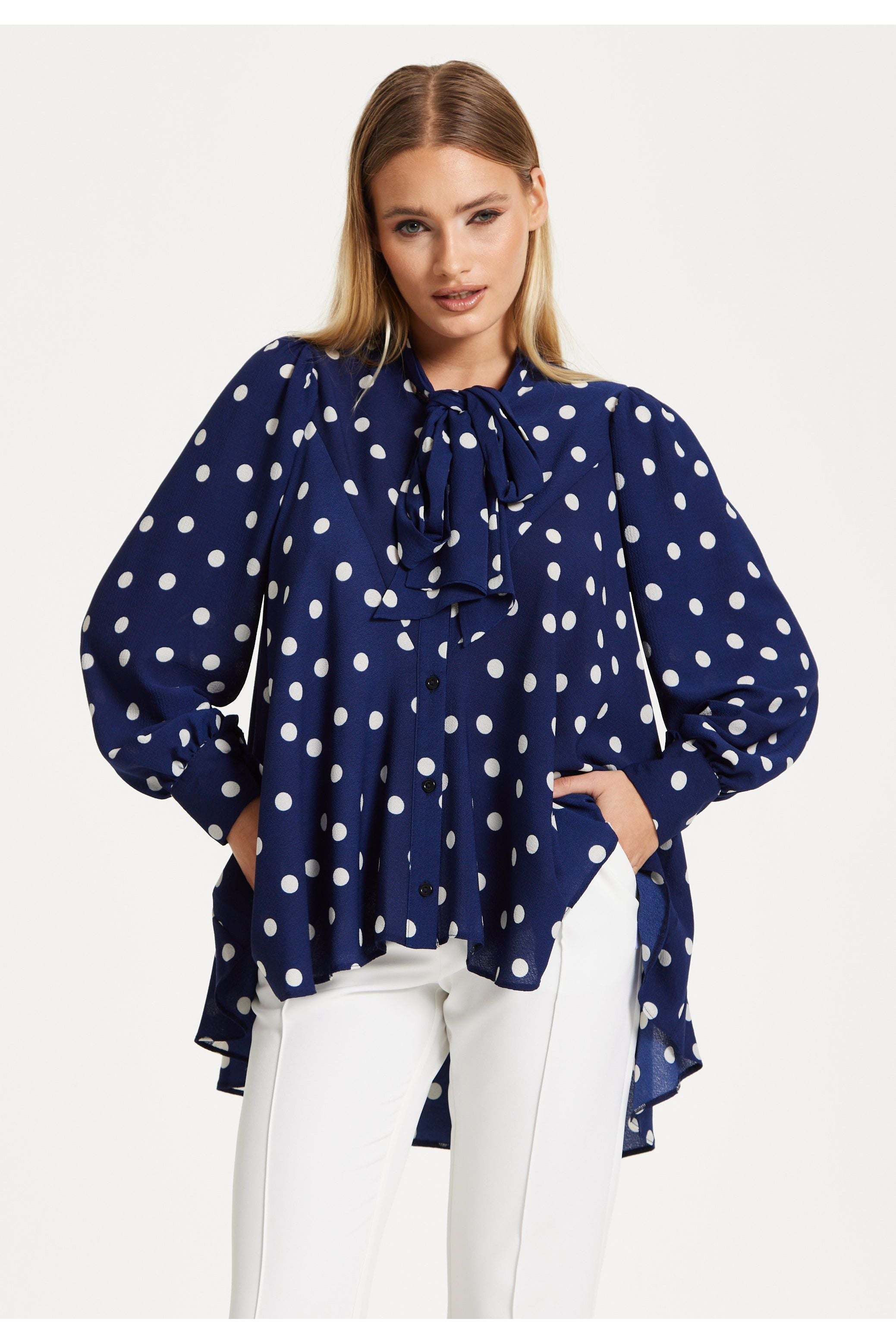 Navy Polka Dot Flared Hem Blouse 25SS8866009