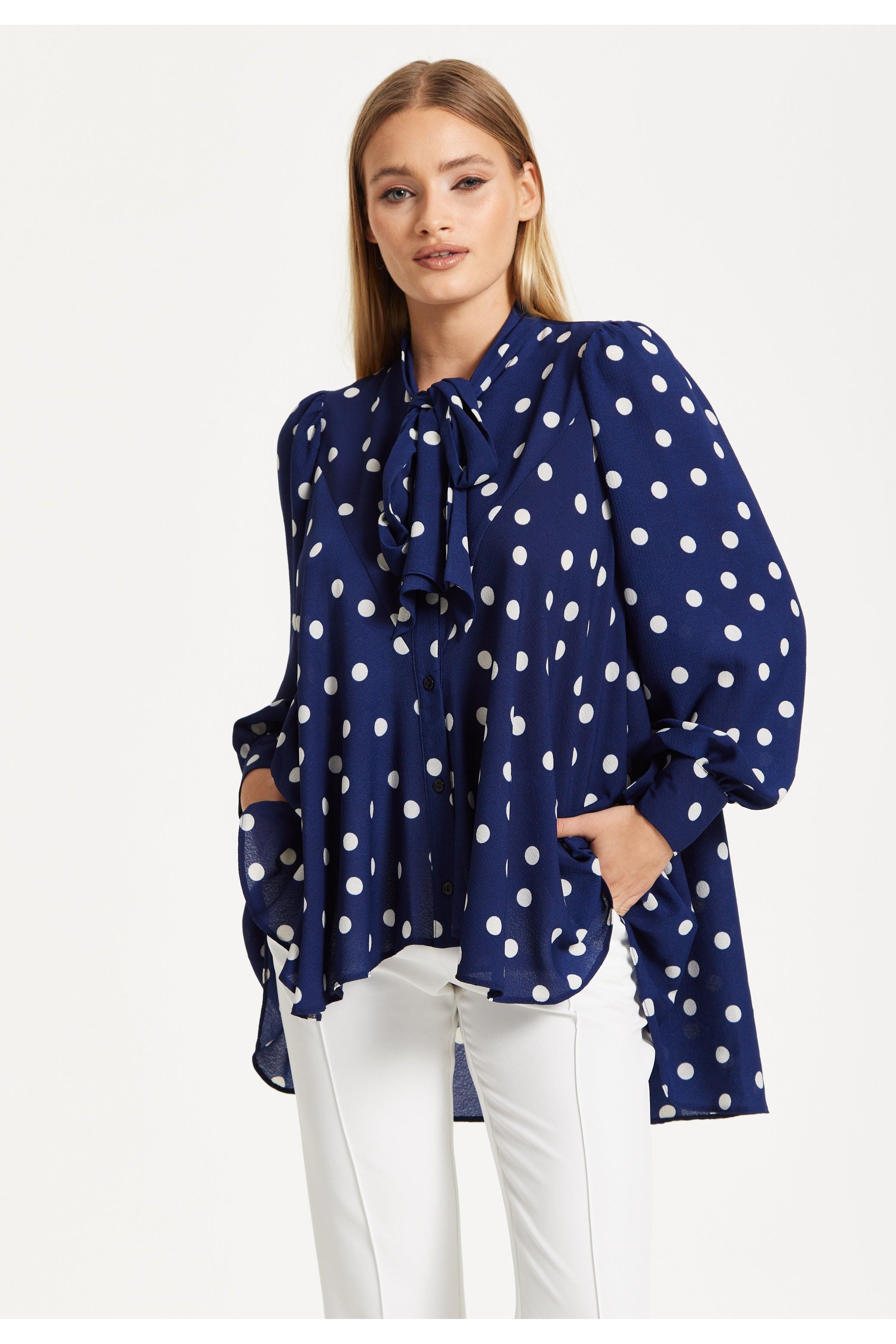 Navy Polka Dot Flared Hem Blouse 25SS8866009