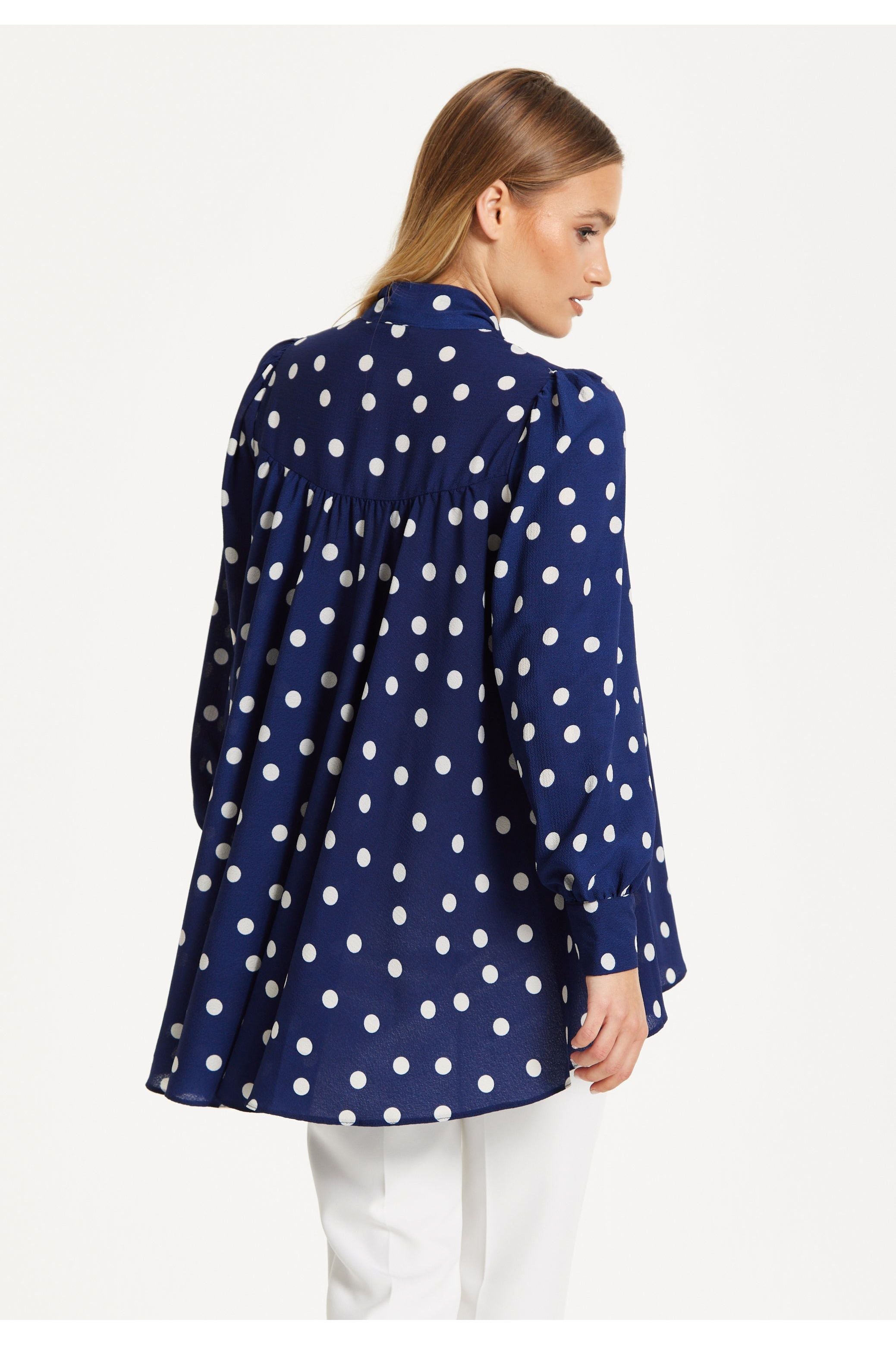 Navy Polka Dot Flared Hem Blouse 25SS8866009