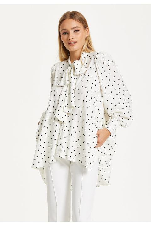 Polka Dot Ruffle High-Low Blouse by Liquorish