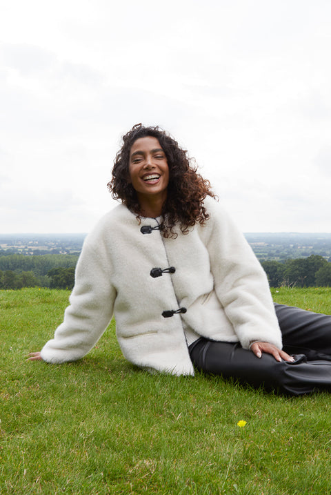 Collarless Toggle Detail Faux Fur Jacket by Blue Vanilla