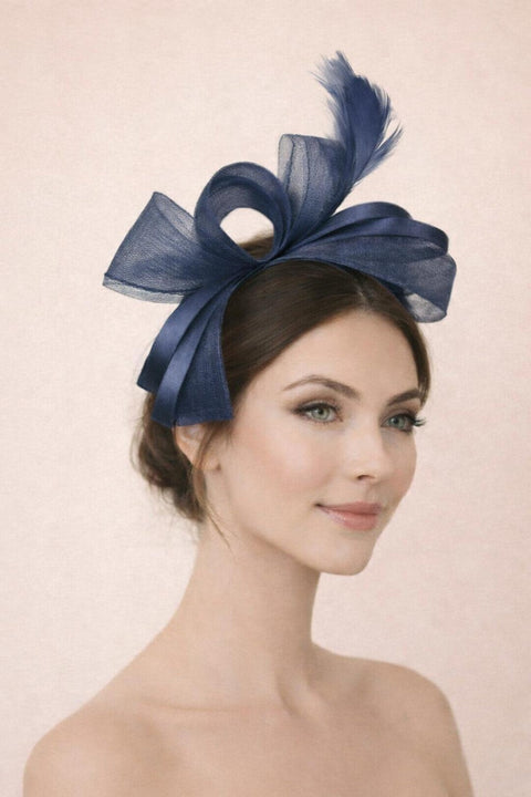 Bow Shaped Fascinator With Satin Loops & Feathers In Navy by SVNX