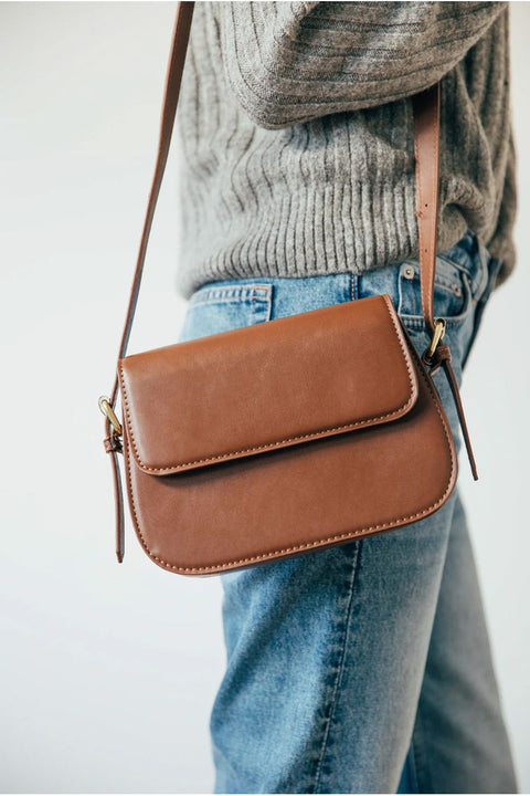 Rounded Cross Body Bag In Brown by SVNX