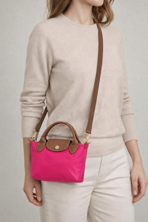 Mini Pouch Crossbody Bag In Hot Pink by SVNX