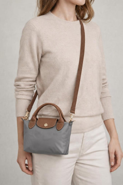 Mini Pouch Crossbody Bag In Grey by SVNX