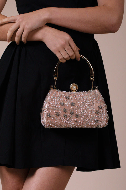Floral Beaded Clutch Bag In Champagne by SVNX