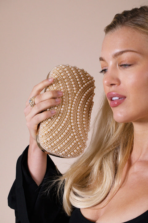 Oval Pearl Clutch Bag In Gold by SVNX