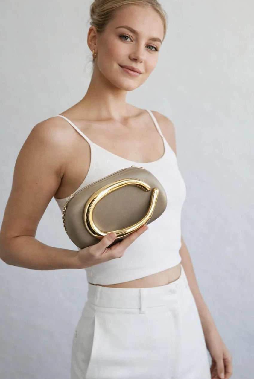Oval Satin Hard Case Clutch Bag In Muted Gold HB362924