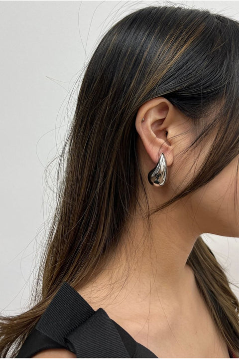 Chunky Droplet Earrings In Silver by SVNX