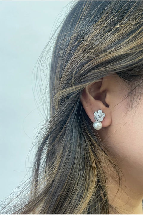 Floral Pearl Stud Earrings In Silver by SVNX