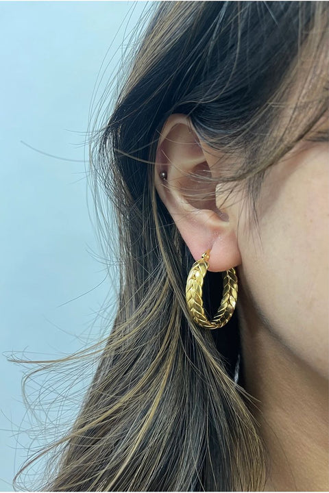 Braided Hoop Earrings In Gold by SVNX