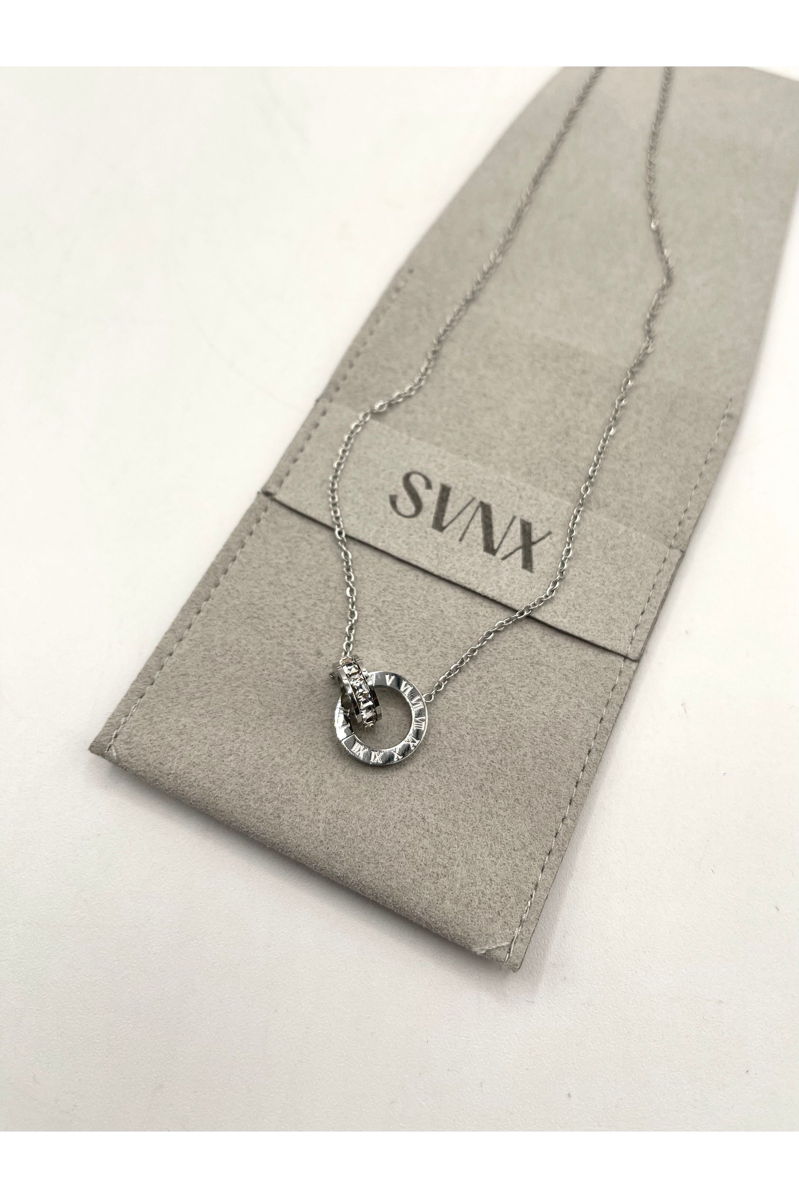 Roman Numeral Necklace In Silver JE402521