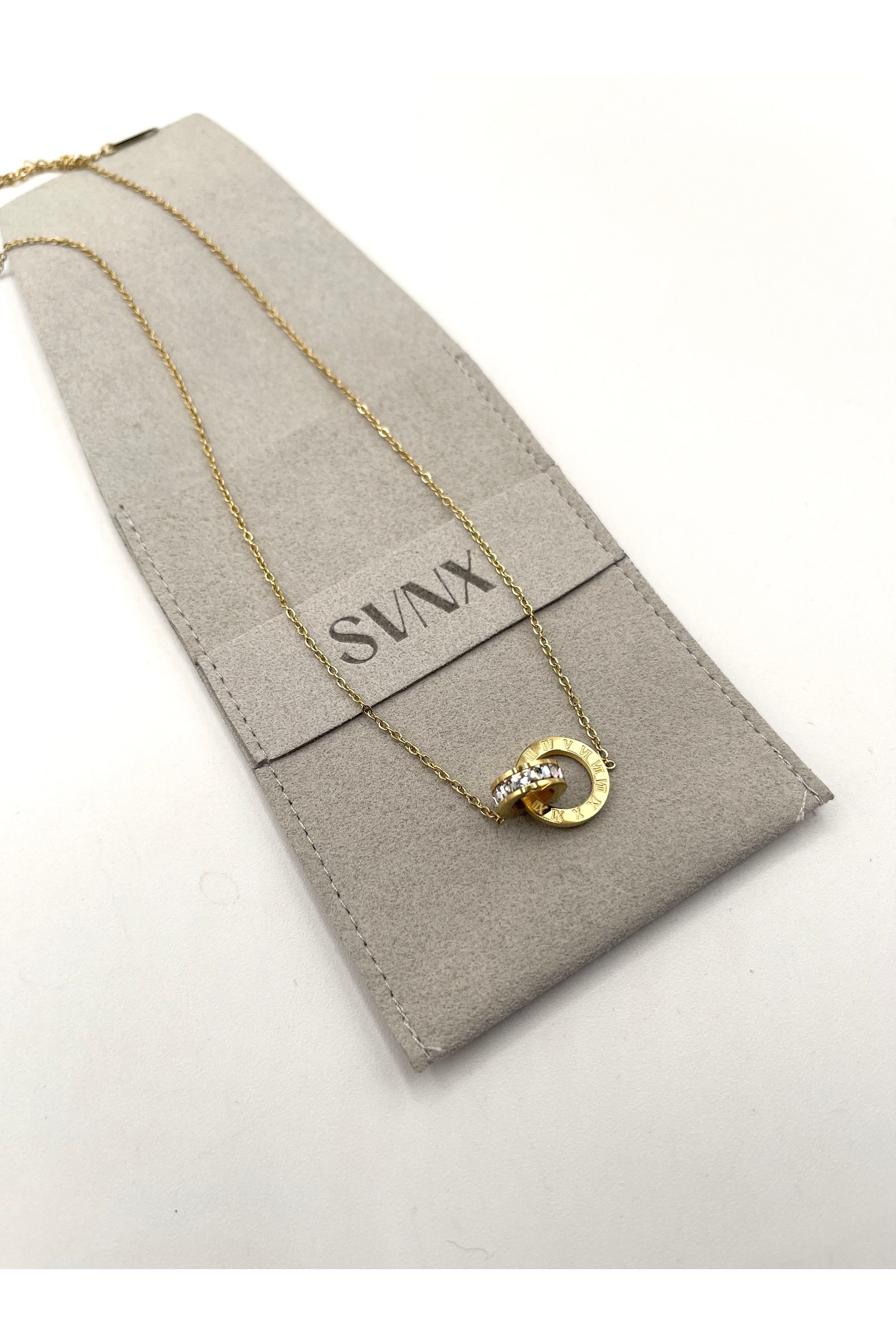 Roman Numeral Necklace In Gold JE402524