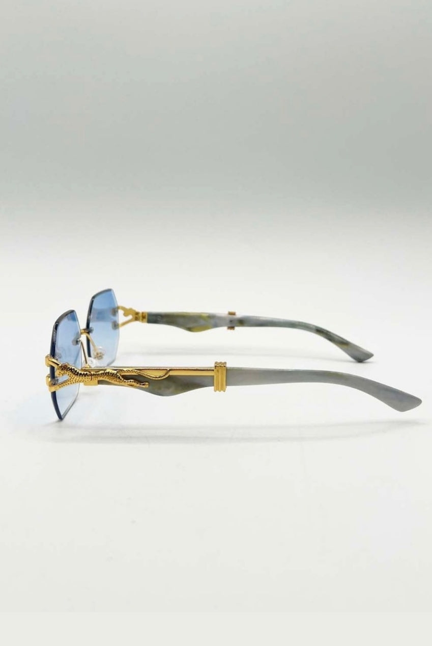 Rimless Oval Geometric Sunglasses In Gold Blue SG2501620