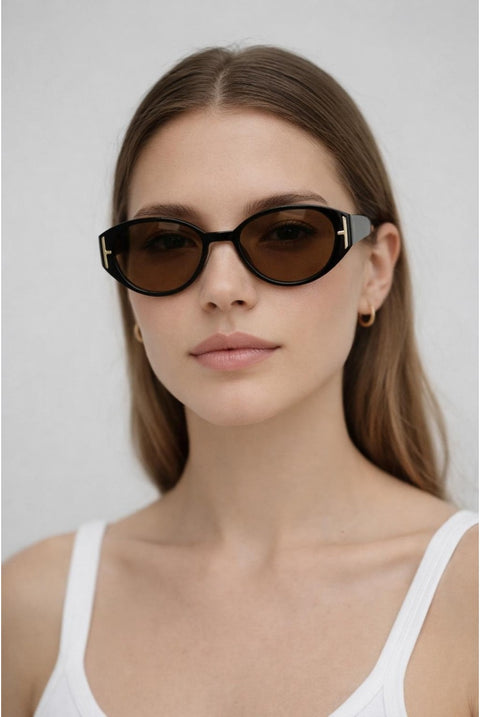 Round Cat Eye Detail Sunglasses In Black by SVNX