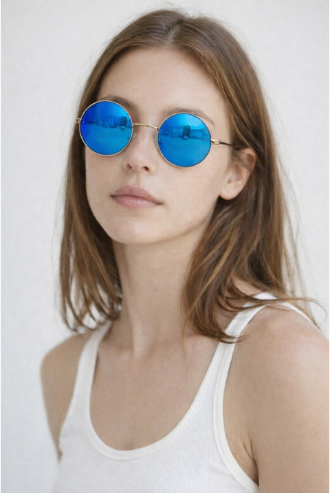 Round Metal Sunglasses In Shiny Silver by SVNX