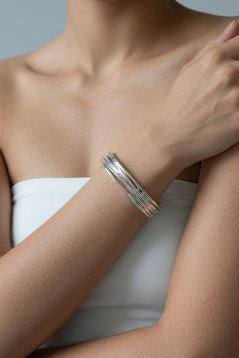 Nami Silver Twist Bangle by Uchi & Soto