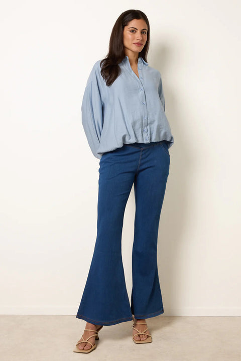 Flared Cross Over Waistband Jeans by Blue Vanilla