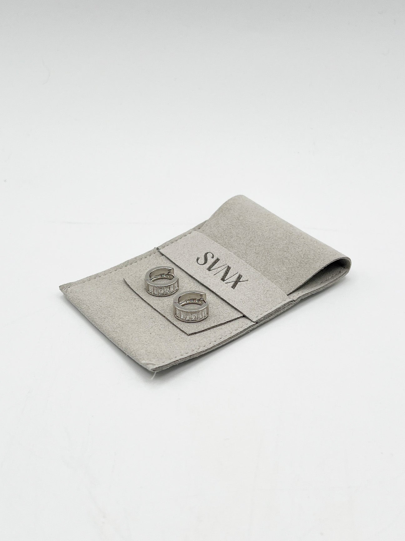 Mini Huggie Hoop With Clear Stones - Silver JE317721