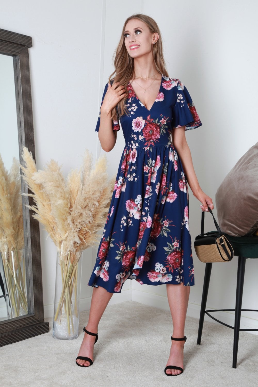 V-Neck Hanky Hem Pleated Floral Dress Goddiva - Main Image