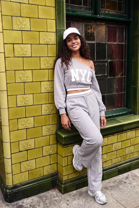 Off The Shoulder Graphic Sweatshirt by Pink Vanilla