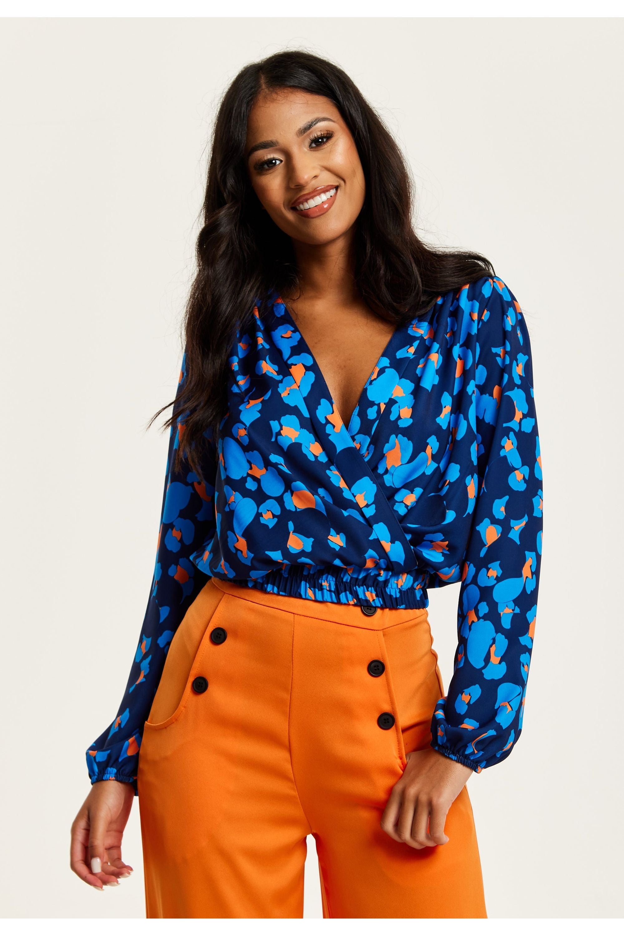 Abstract Print Wrap Top In Pink Orange And Blue LIQ23AW086