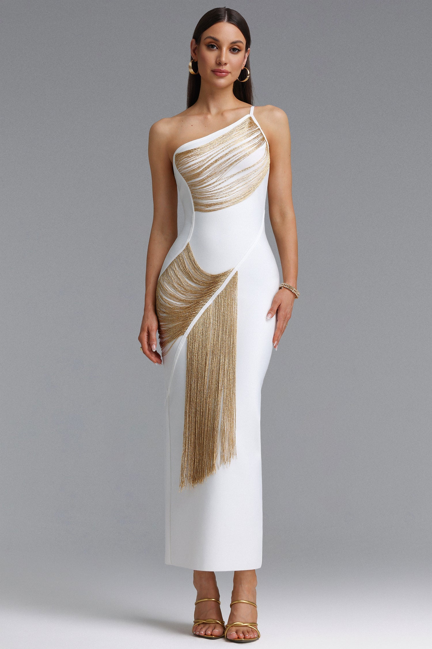 Roanna One Shoulder Sleeveless Golden Tassels Bandage White Maxi Dress D250701239