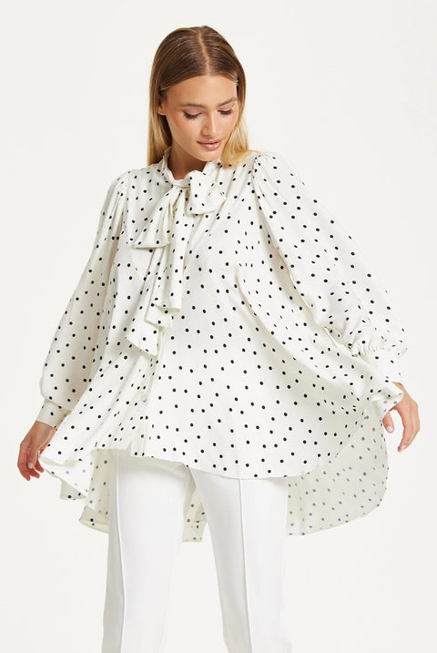 Polka Dot Ruffle High-Low Blouse by Liquorish