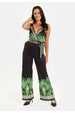 Leaf Printed V Neck Jumpsuit With Tie Detail by Liquorish