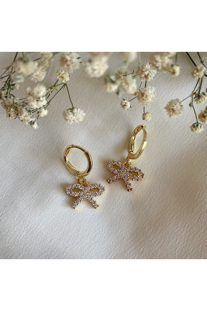 Audrey Dainty CZ Bow Huggie Hoop Earrings audreyhuggiehoops