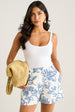 White Textured Floral Print Shorts by Gini London