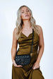 Quilted Crossbody Bag In Black by SVNX