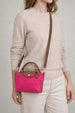 Mini Pouch Crossbody Bag In Hot Pink by SVNX