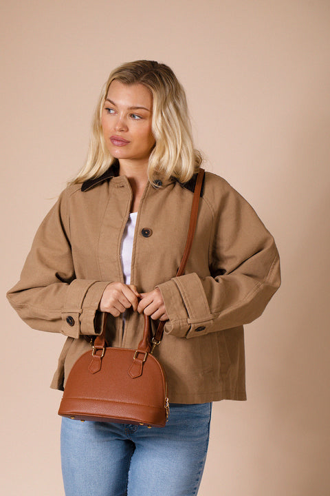 Faux Leather Mini Crossbody Bag In Brown by SVNX