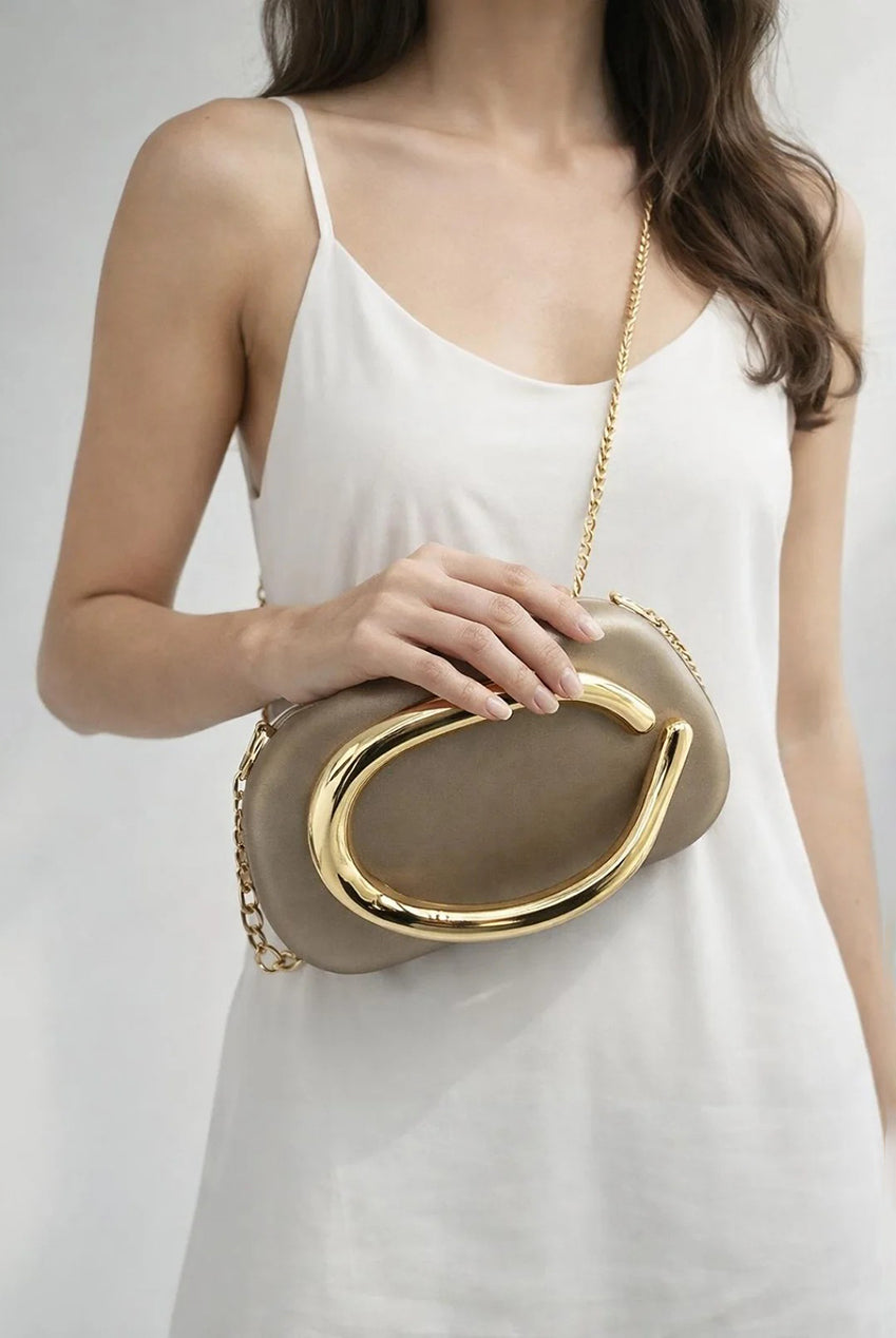 Oval Satin Hard Case Clutch Bag In Muted Gold HB362924