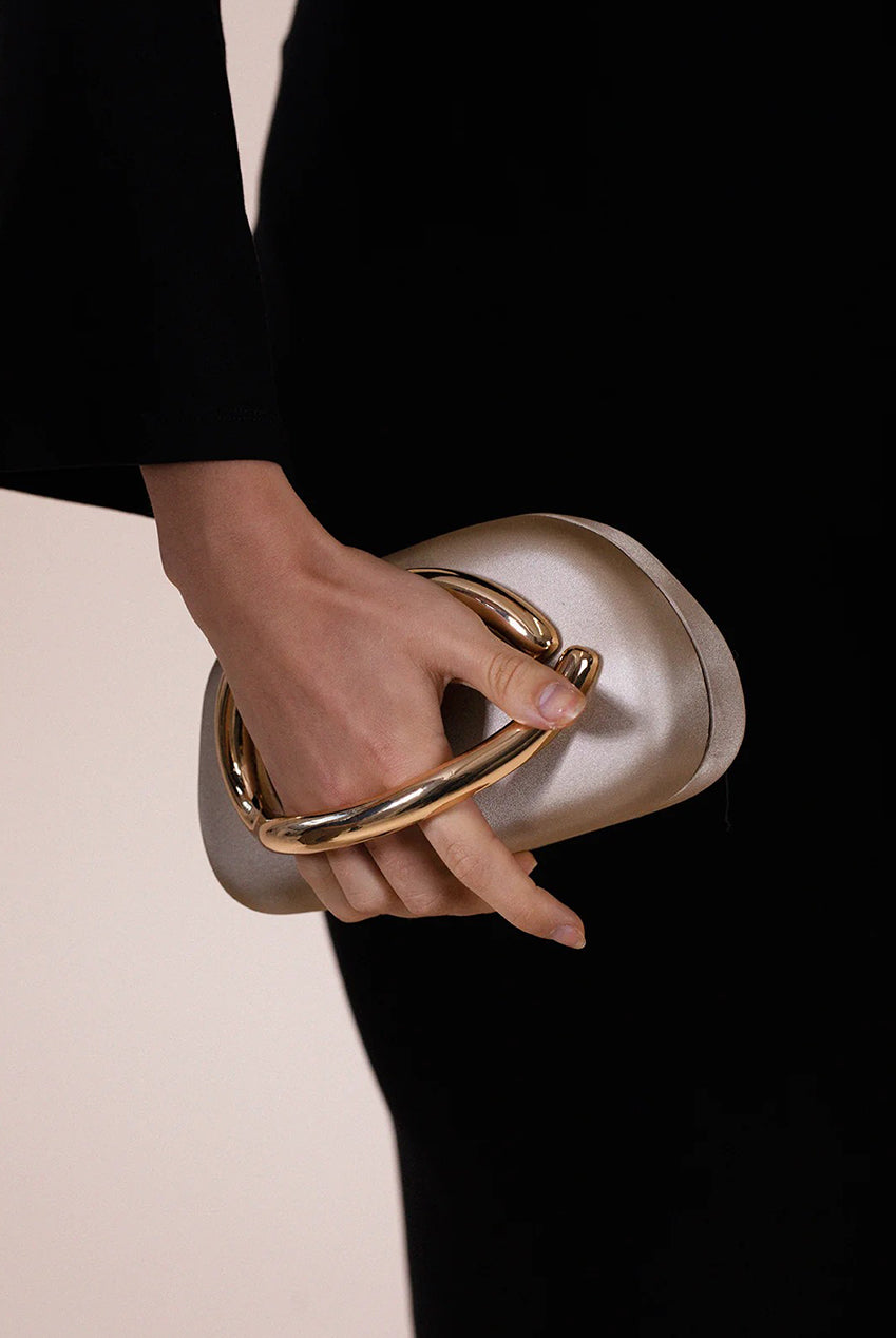 Oval Satin Hard Case Clutch Bag In Muted Gold HB362924