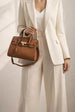 Top Handle Satchel Handbag In Brown by SVNX