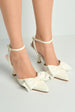 Alua Bow Detail Anklestrap Court Shoes In White by Miss Diva