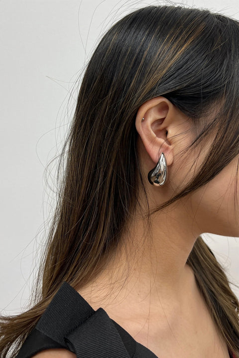 Chunky Droplet Earrings In Silver by SVNX