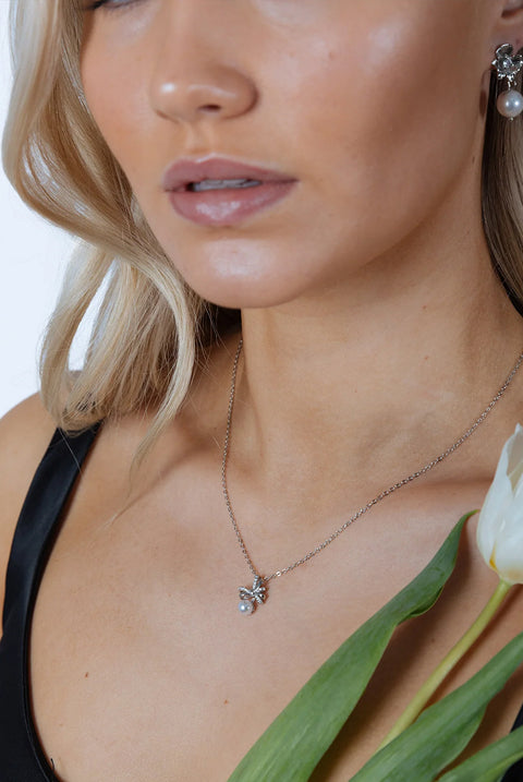 Dainty Bow Pearl Pendant Necklace by SVNX