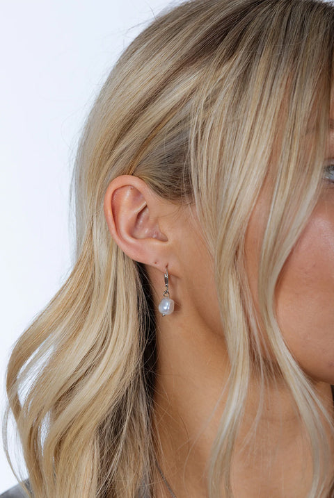 Baroque Pearl Earrings In Silver by SVNX
