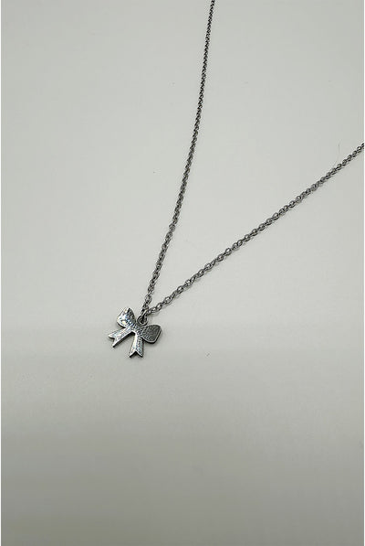 Silver - Mini Bow Pendant Necklace In Silver by SVNX