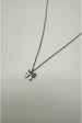 Mini Bow Pendant Necklace In Silver by SVNX
