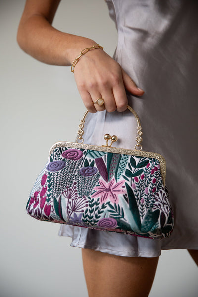 Multi - Floral Embroidered Clutch Bag by SVNX