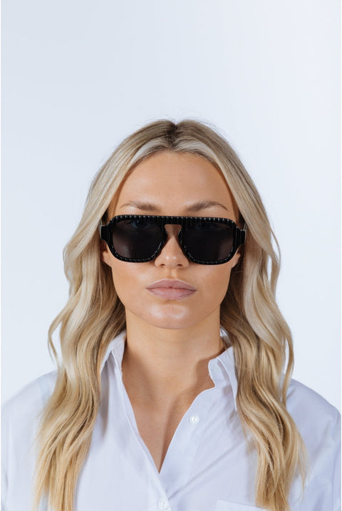 Retro Ribbed Navigator Sunglasses In Black by SVNX