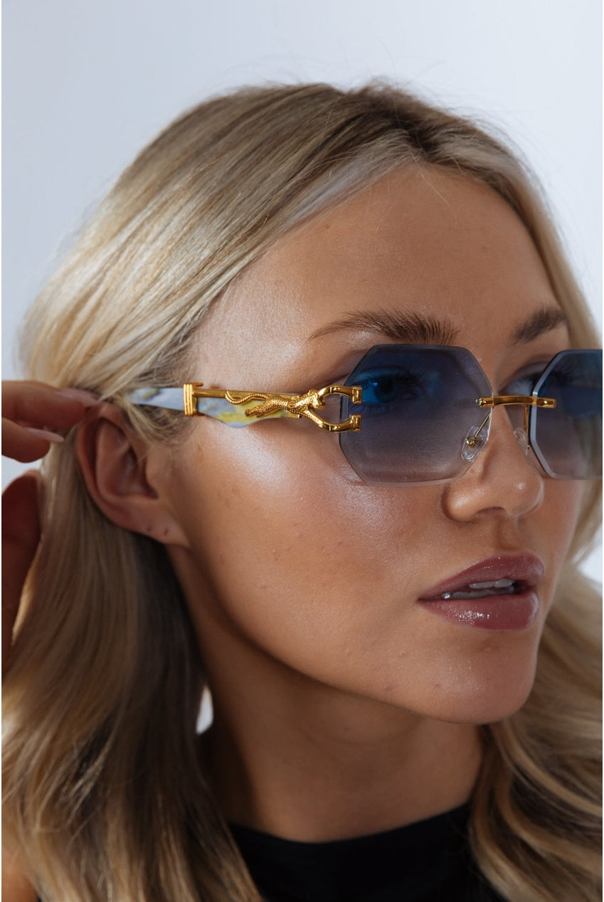 Rimless Oval Geometric Sunglasses In Gold Blue SG2501620