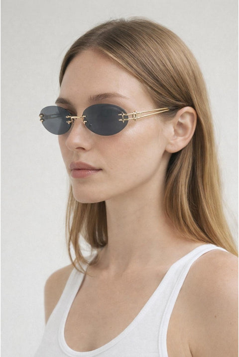 Rimless Oval Sunglasses In Black by SVNX